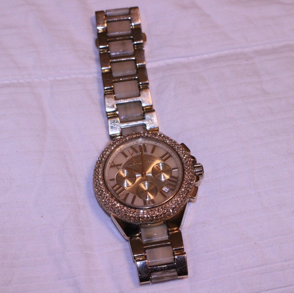 Collection of Fossil and Michael Kors watches